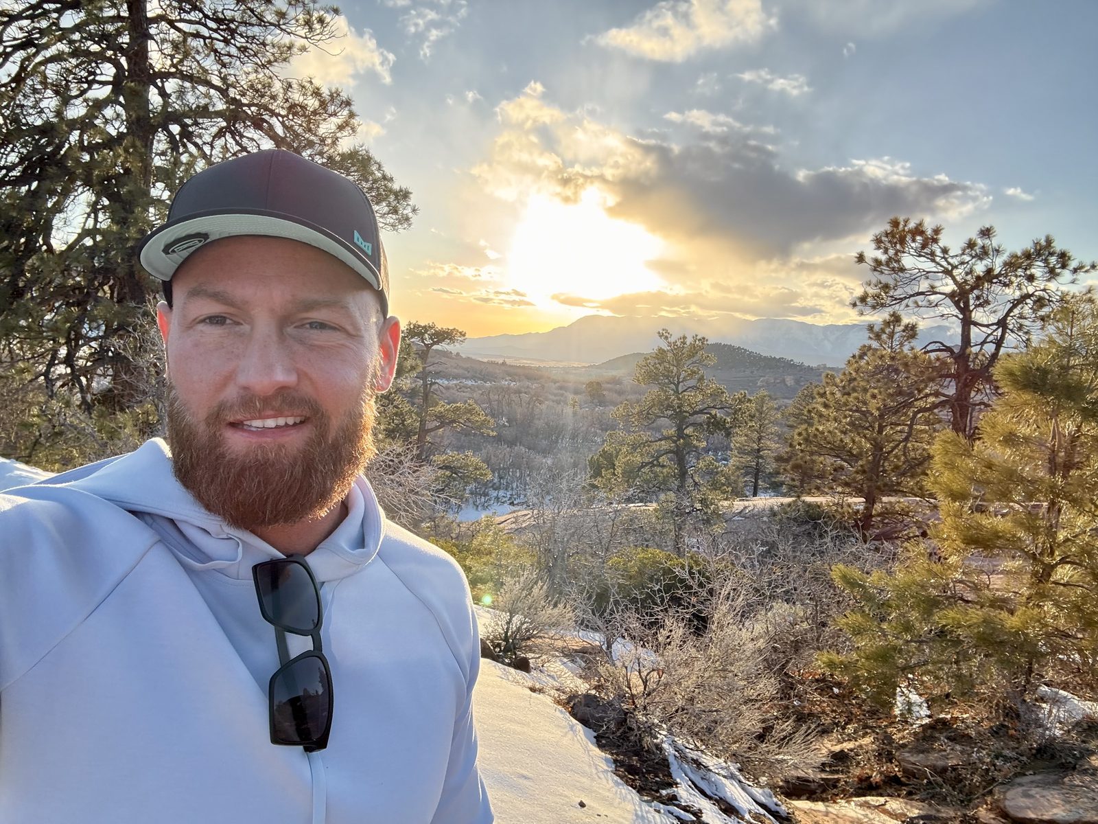 Dallas Manker outdoors at sunset in the mountains